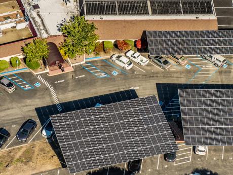 A health club with ground mount solar shade structures